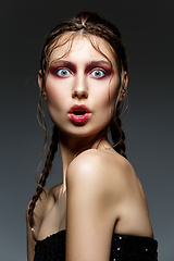 Image showing beautiful girl with modern braids and red makeup