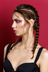 Image showing beautiful girl with modern braids and red makeup