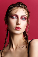 Image showing beautiful girl with modern braids and red makeup