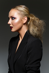 Image showing beautiful blond girl with dark makeup