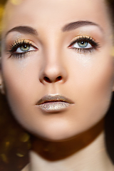 Image showing beautiful blond girl with sparkling makeup