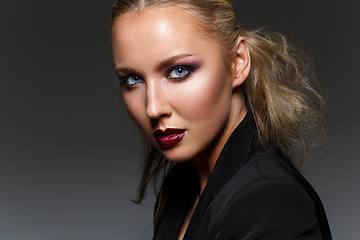 Image showing beautiful blond girl with dark makeup