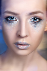 Image showing beautiful blond girl with sparkling makeup