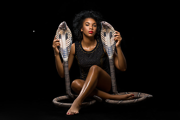 Image showing beautiful girl with snakes