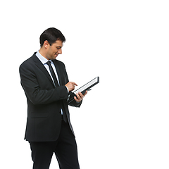 Image showing handsome businessman in suit with tablet