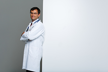 Image showing doctor in white robe with stethoscope