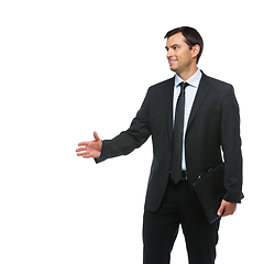 Image showing handsome businessman in suit with tablet