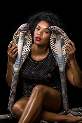Image showing beautiful girl with snakes