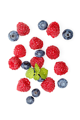 Image showing blueberry and raspberry berries isolated on white background