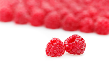 Image showing raspberry berries isolated on white