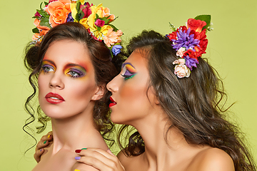 Image showing beautiful girls with flower accessories