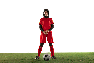 Image showing Arabian female soccer or football player isolated on white studio background