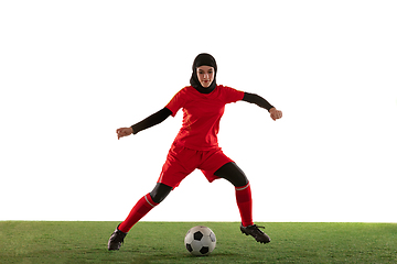 Image showing Arabian female soccer or football player isolated on white studio background