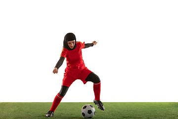 Image showing Arabian female soccer or football player isolated on white studio background