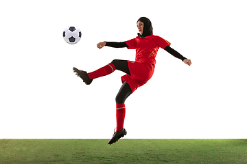 Image showing Arabian female soccer or football player isolated on white studio background