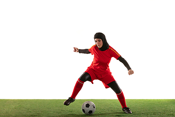 Image showing Arabian female soccer or football player isolated on white studio background