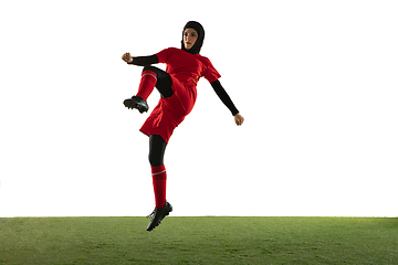 Image showing Arabian female soccer or football player isolated on white studio background