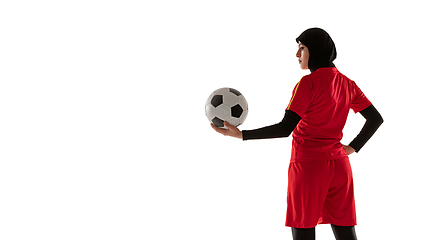 Image showing Arabian female soccer or football player isolated on white studio background