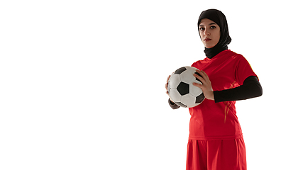 Image showing Arabian female soccer or football player isolated on white studio background