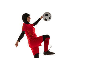 Image showing Arabian female soccer or football player isolated on white studio background