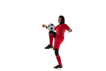 Image showing Arabian female soccer or football player isolated on white studio background