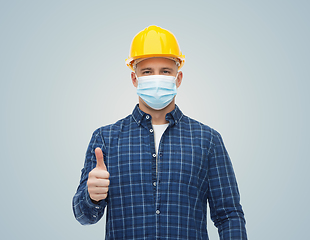 Image showing male worker in safety helmet wearing face mask