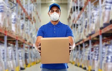 Image showing indian delivery man with parcel box in respirator