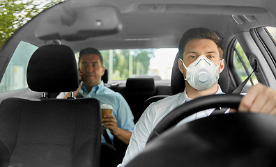 Image showing taxi driver in mask driving car with passenger