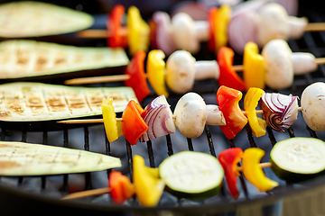 Image showing vegetables and mushrooms roasting on brazier grill