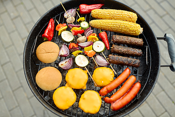 Image showing barbecue kebab meat and vegetables on grill