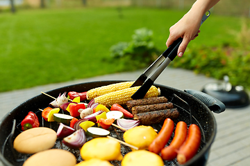 Image showing barbecue kebab meat and vegetables on grill