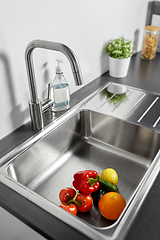 Image showing fruits and vegetables in kitchen sink