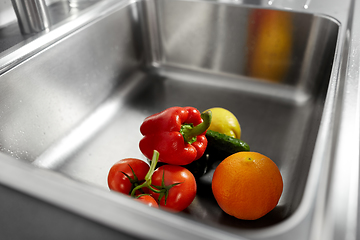 Image showing fruits and vegetables in kitchen sink