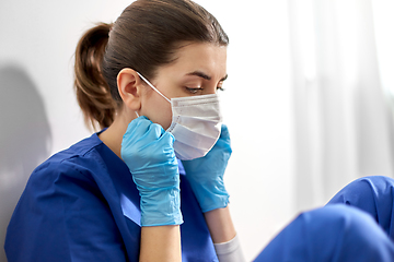 Image showing sad doctor or nurse in protective face mask