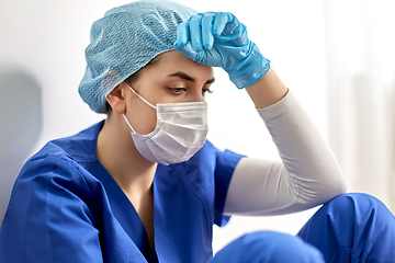 Image showing sad doctor or nurse in protective face mask