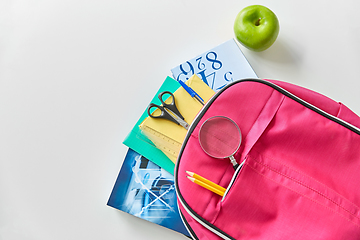 Image showing backpack with books, school supplies and apple