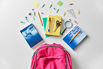 Image showing pink backpack with books and school supplies