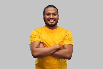 Image showing smiling african american man with crossed arms