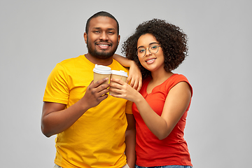 Image showing happy african american couple with coffee cups