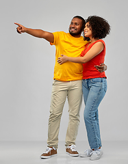 Image showing african american couple pointing to something