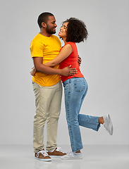 Image showing happy african american couple hugging