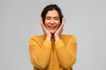 Image showing happy smiling young woman with pierced nose