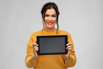 Image showing happy young woman showing tablet pc computer