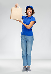 Image showing delivery woman with food in paper bag