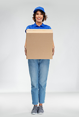 Image showing happy smiling delivery woman with parcel box