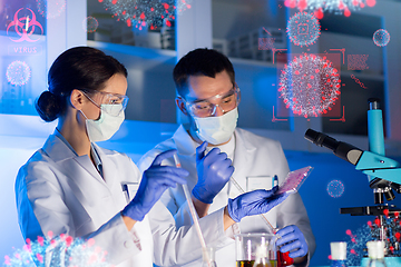 Image showing scientists working on coronavirus vaccine at lab