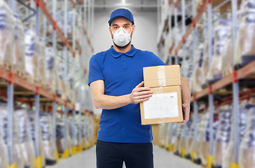 Image showing delivery man in mask or respirator at warehouse