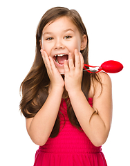 Image showing Portrait of a little girl in red