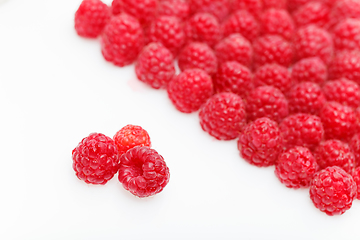 Image showing raspberry berries isolated on white