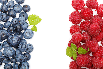 Image showing blueberry and raspberry berries isolated on white background